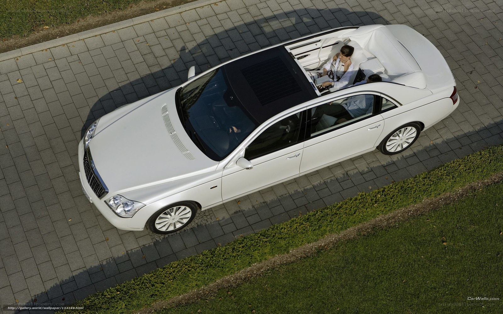 White luxury car with open roof