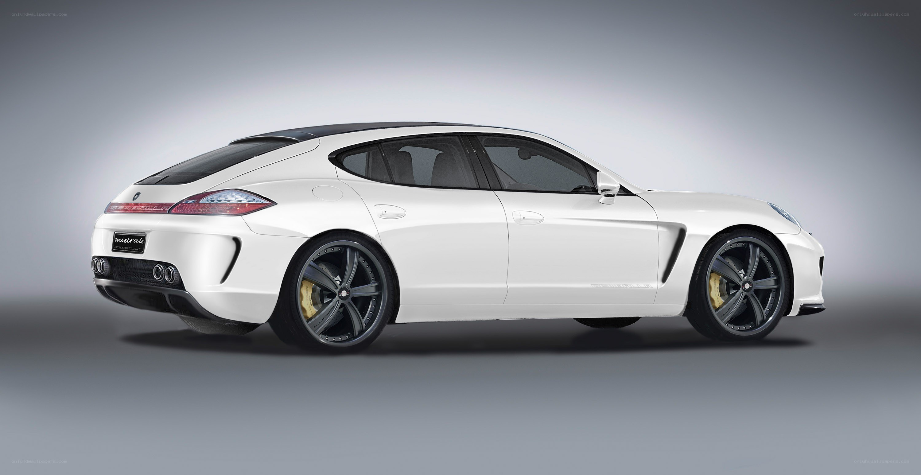 white luxury coupe car