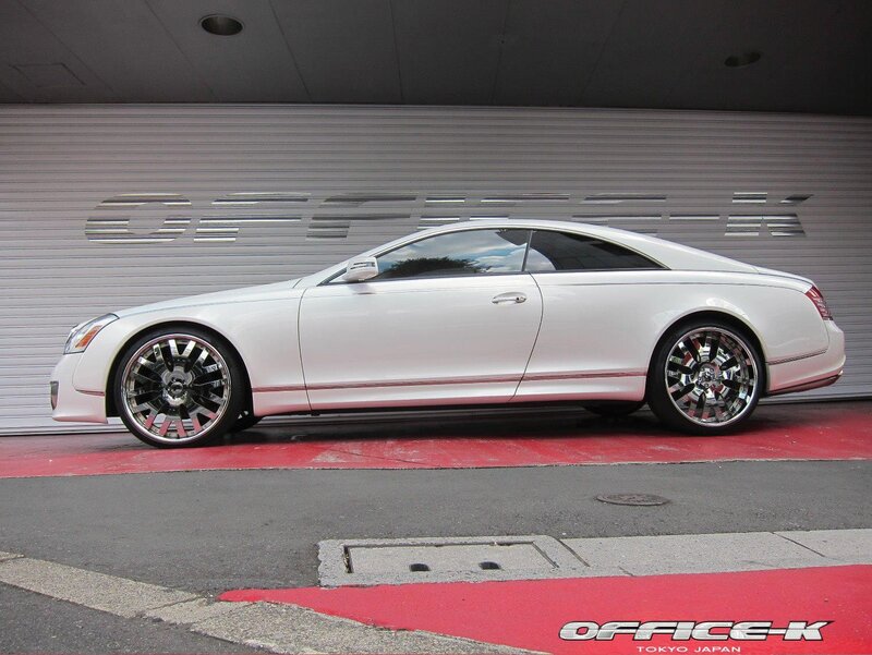 White luxury coupe on display