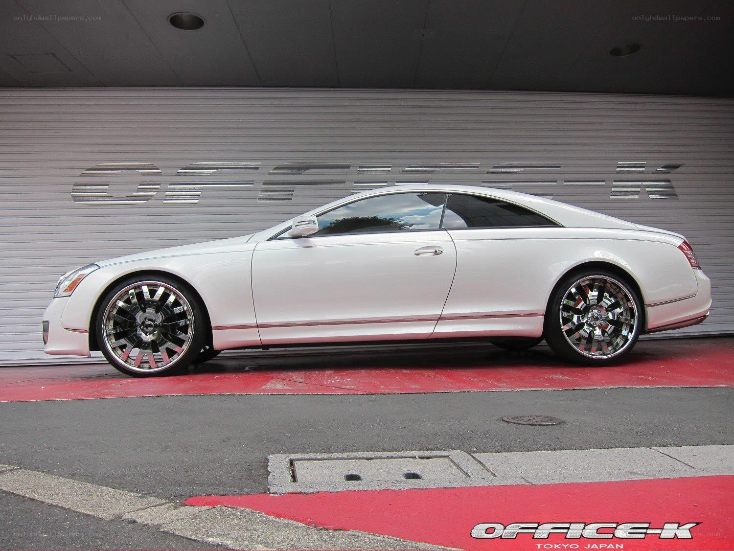 White luxury coupe on display