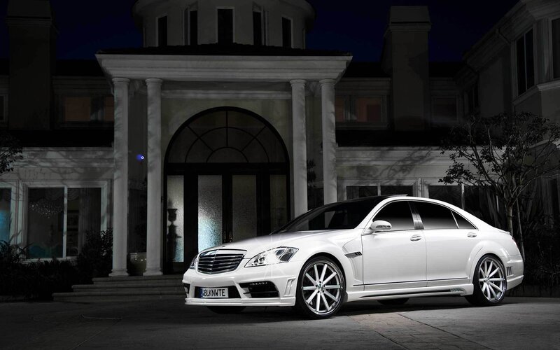 White luxury sedan at night