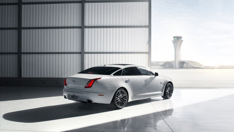 White Luxury Sedan — Silver