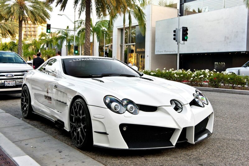 White luxury sports car on city street