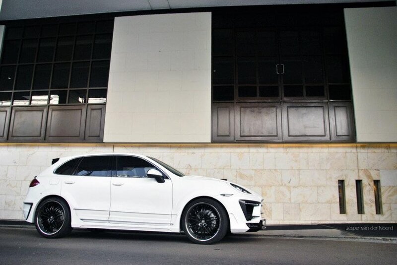 white luxury SUV parked