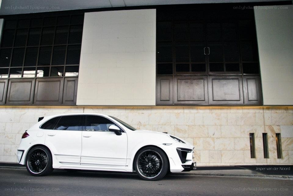 white luxury SUV parked