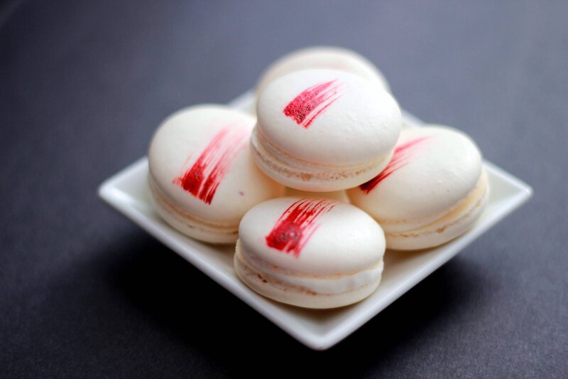White Macarons with Red Stripes