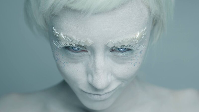 white makeup with geometric eyebrows