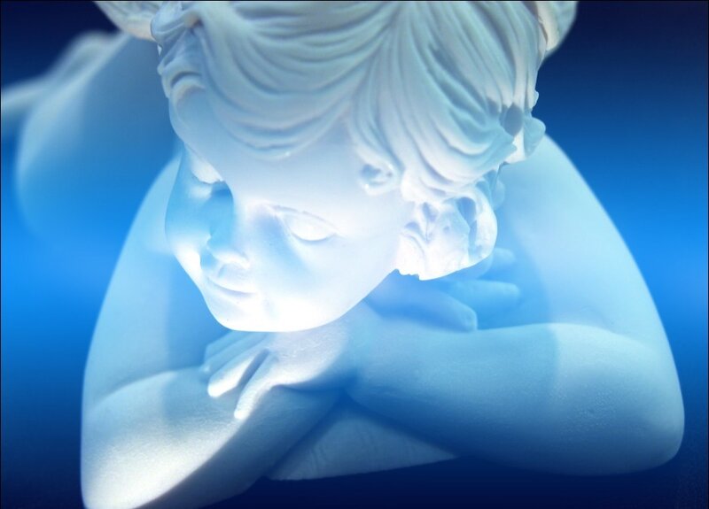 white marble cherub statue
