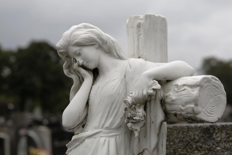 White Marble Statue — Somber
