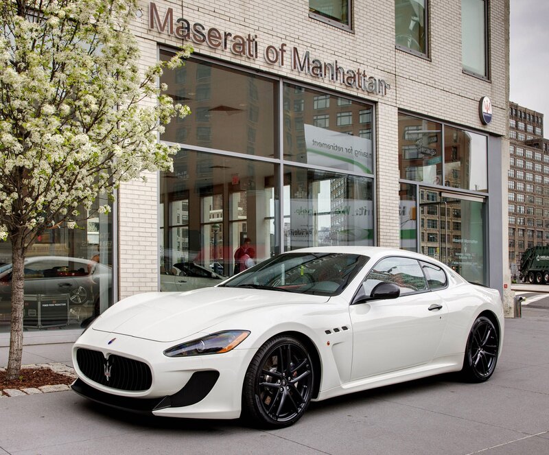 White Maserati at dealership