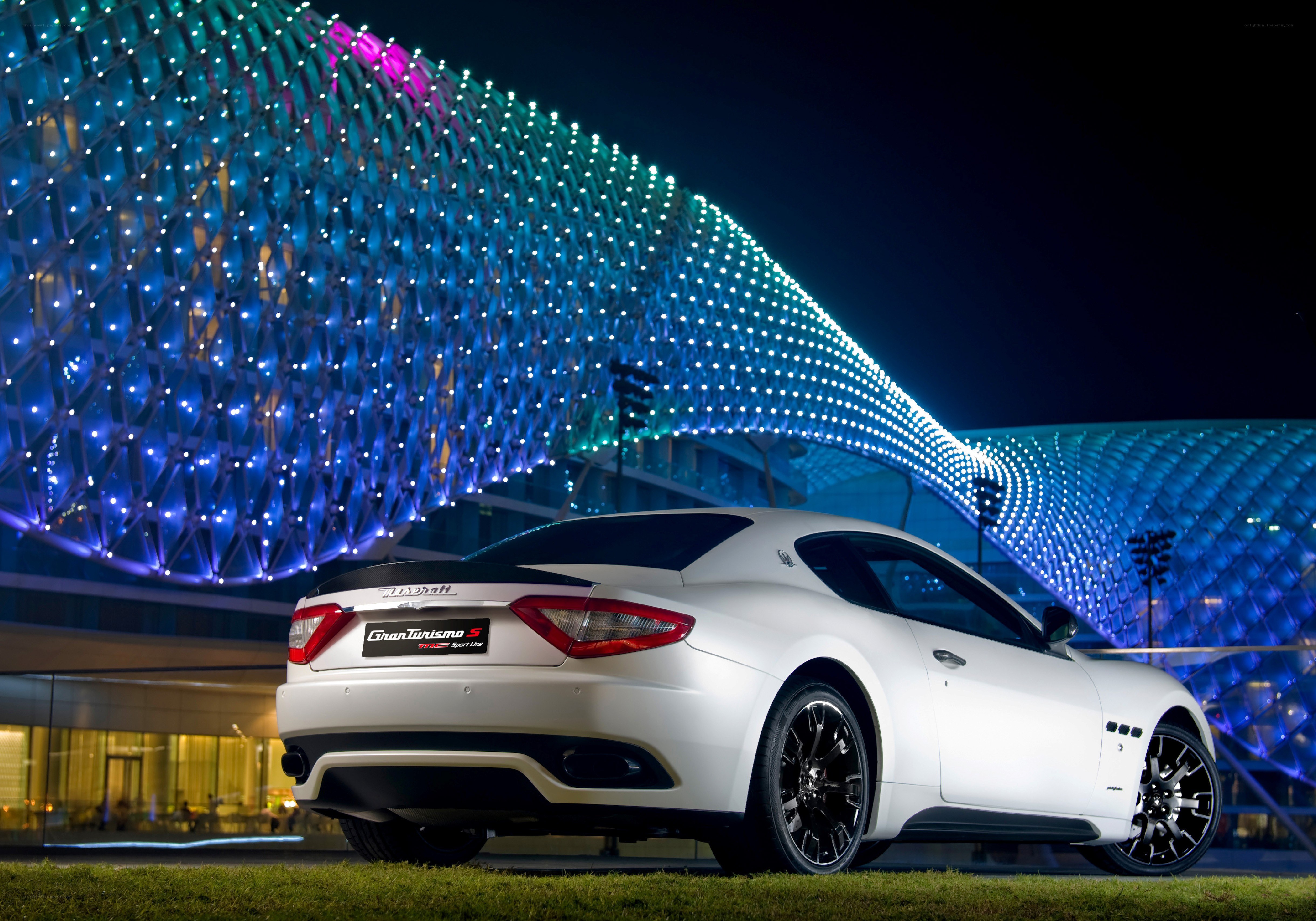 White Maserati at night