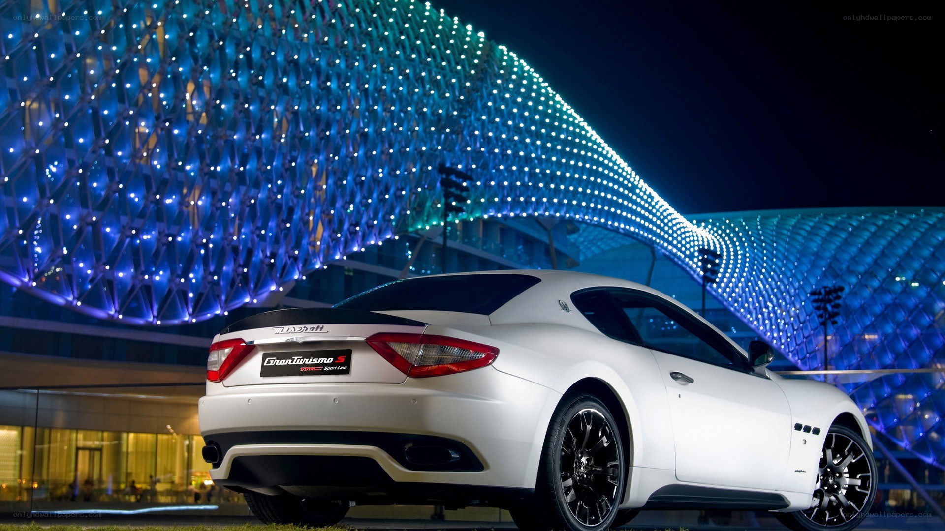White Maserati at night