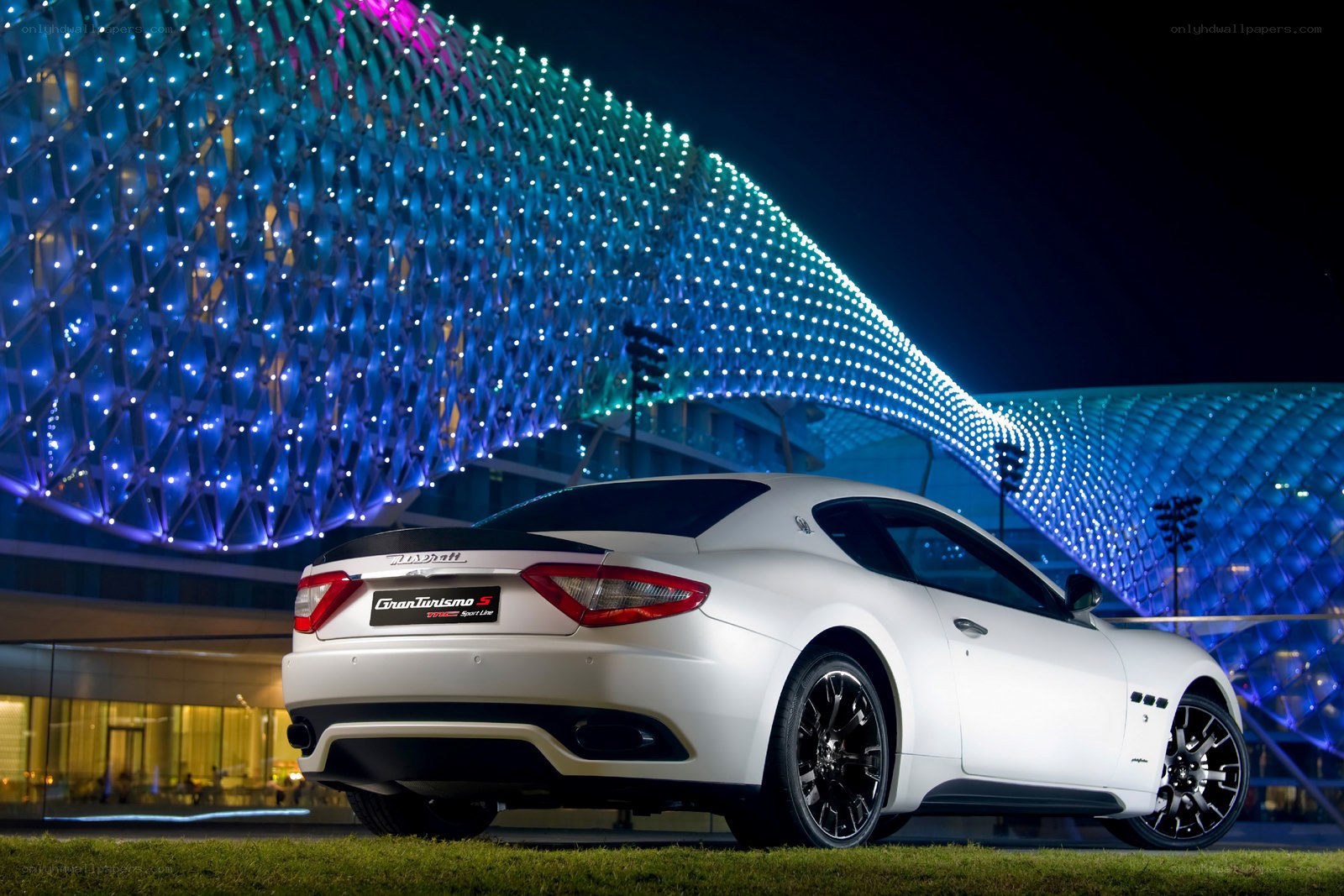 White Maserati at night