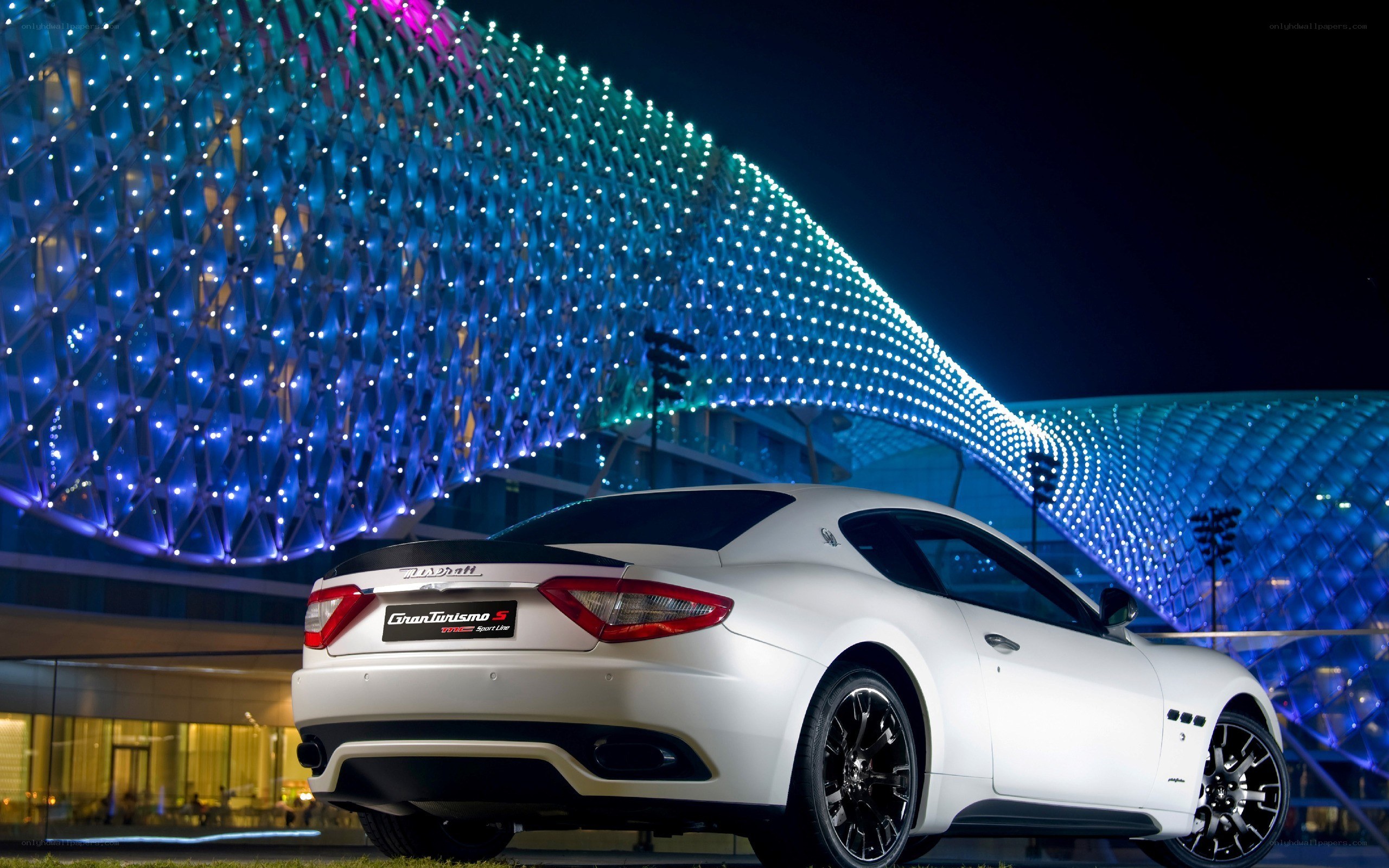 White Maserati at night