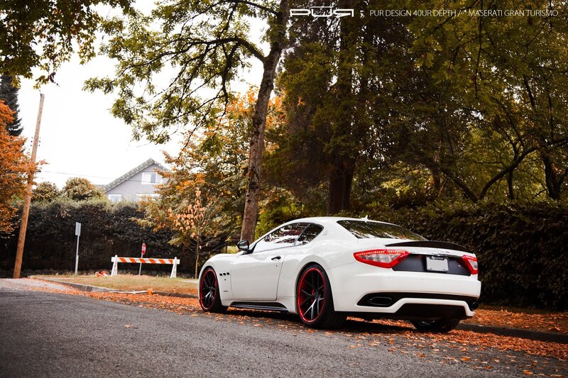 White Maserati GranTurismo on a leafy street