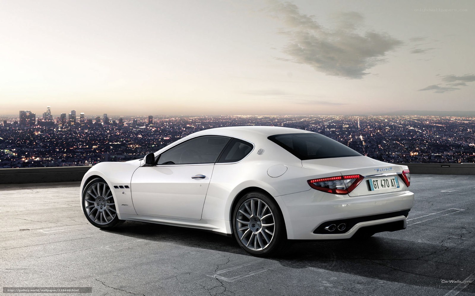 White Maserati GT on city view