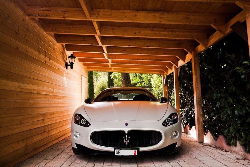 White Maserati in wooden garage