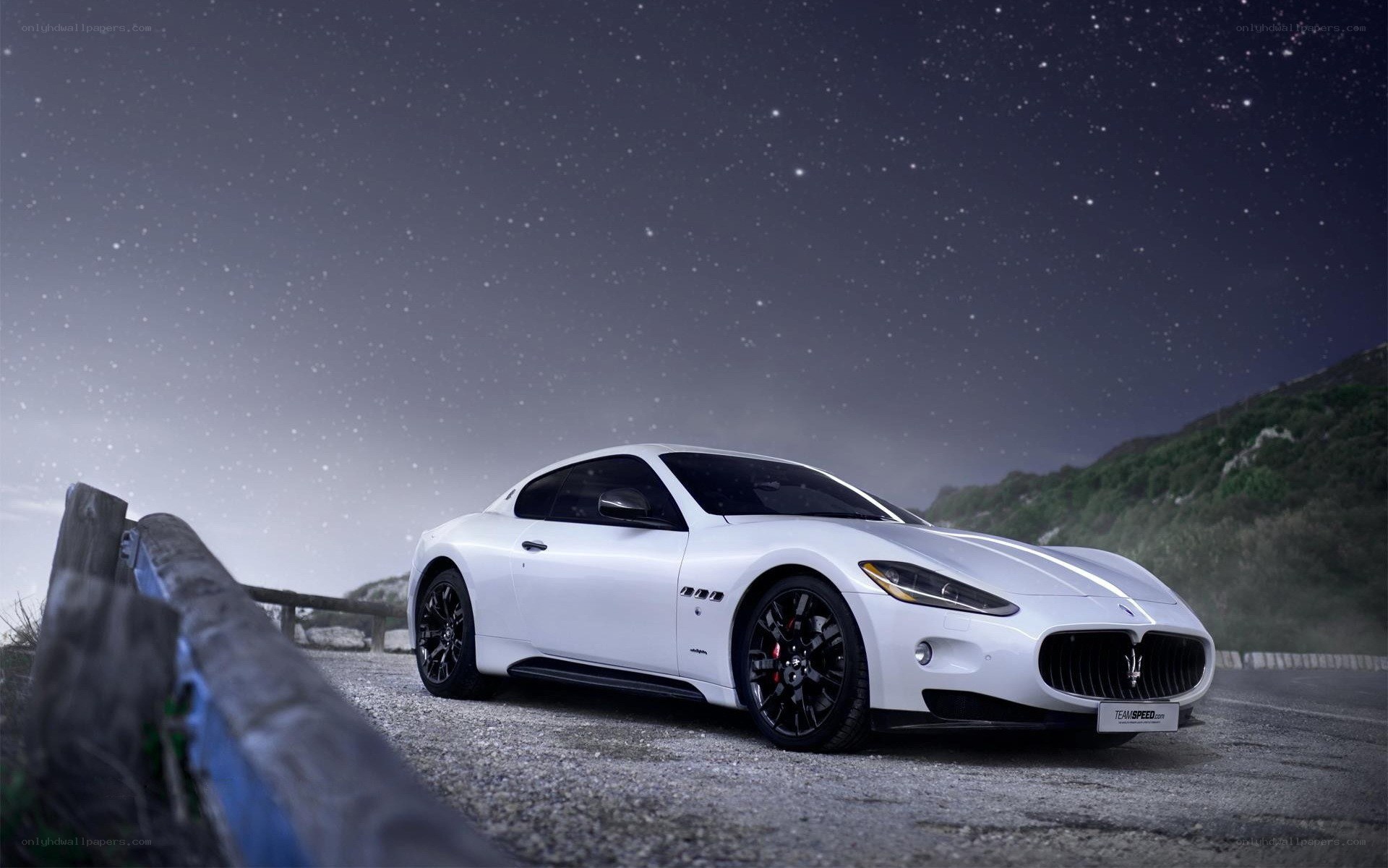 White Maserati on a starry night