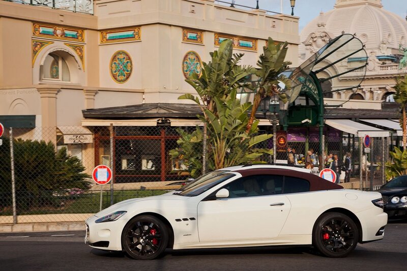 White Maserati on city street