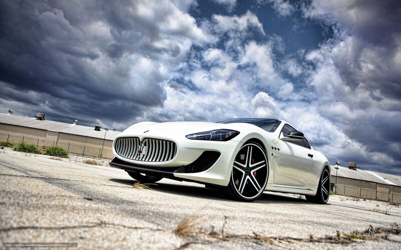 White Maserati on cloudy day