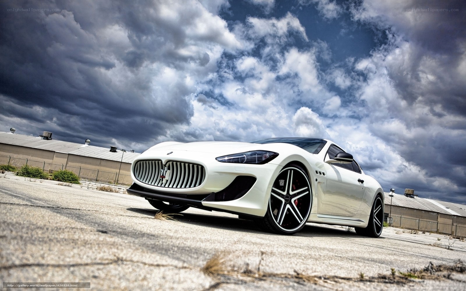 White Maserati on cloudy day