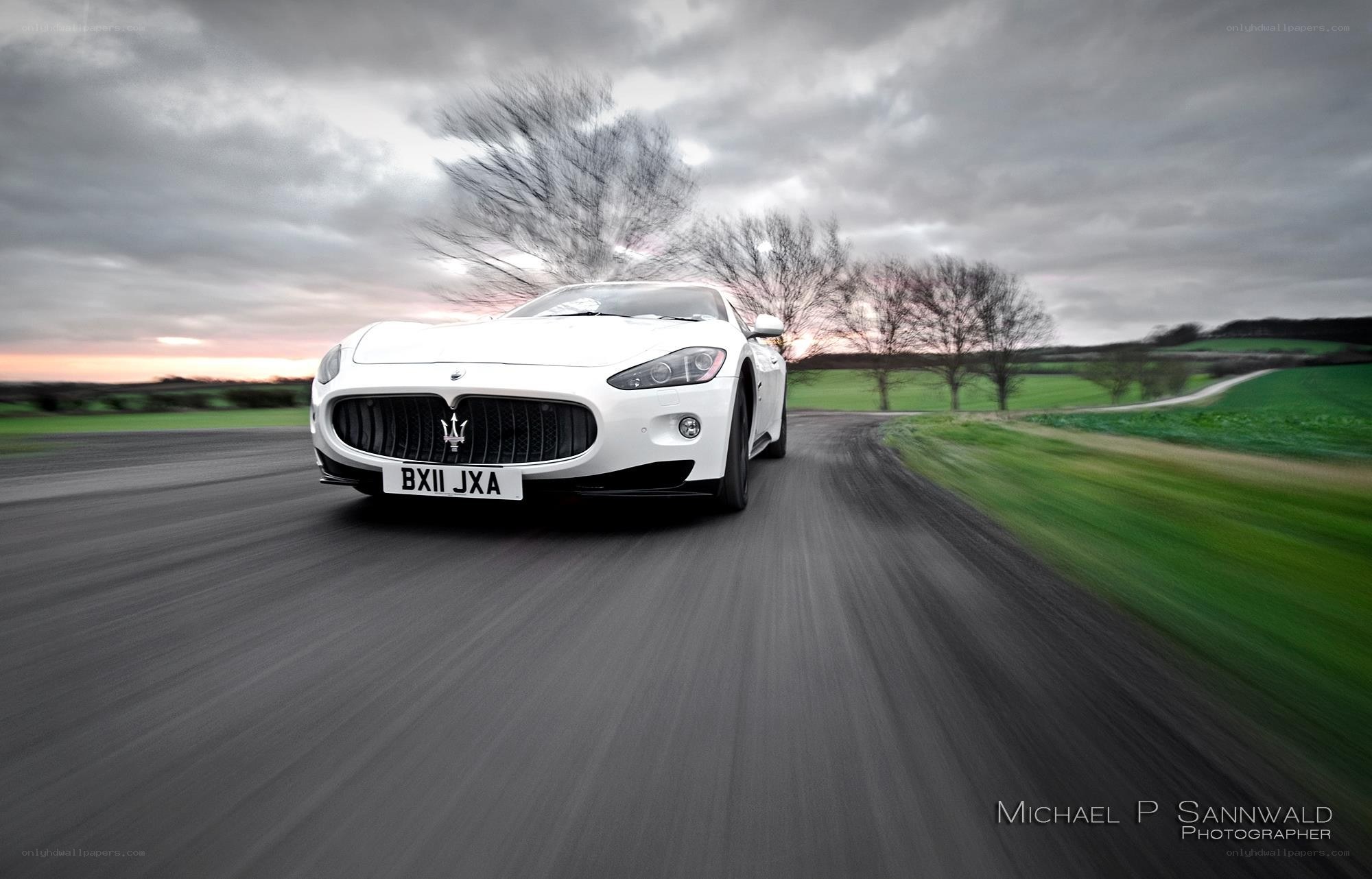 White Maserati on country road