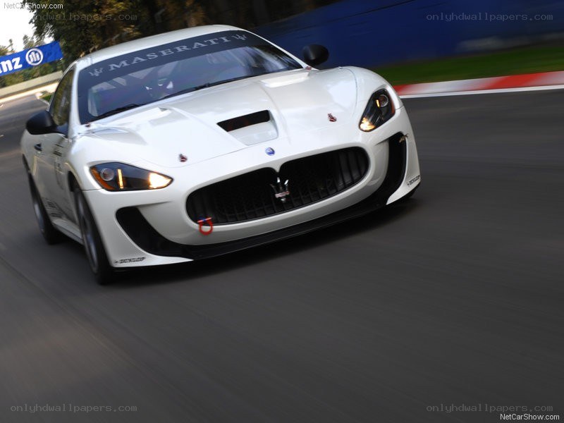 white maserati on racetrack