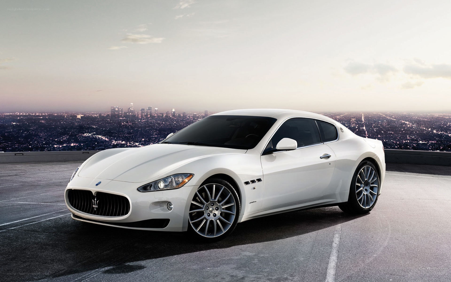 White Maserati on rooftop