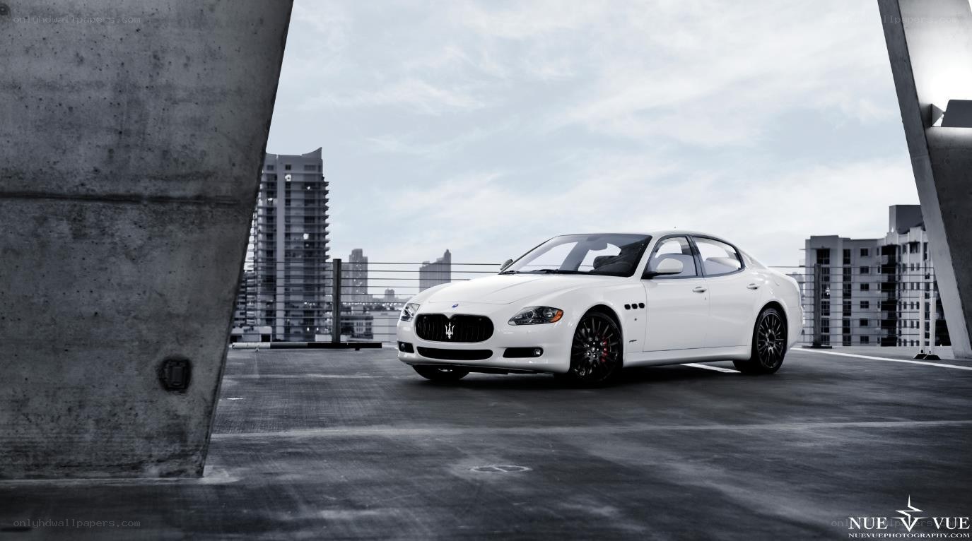 White Maserati on rooftop