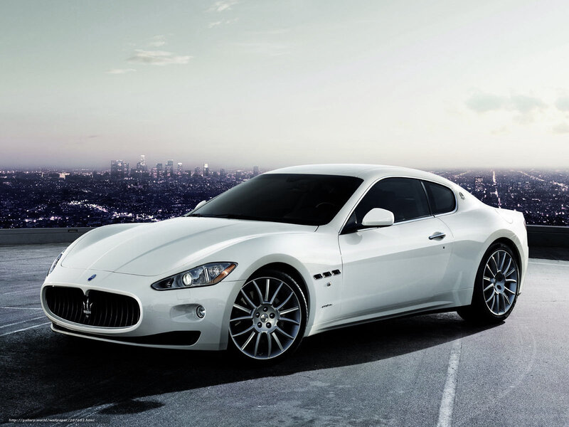 White Maserati on rooftop