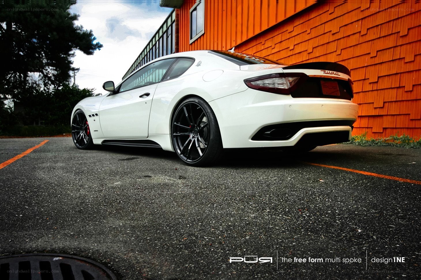 white maserati with custom wheels
