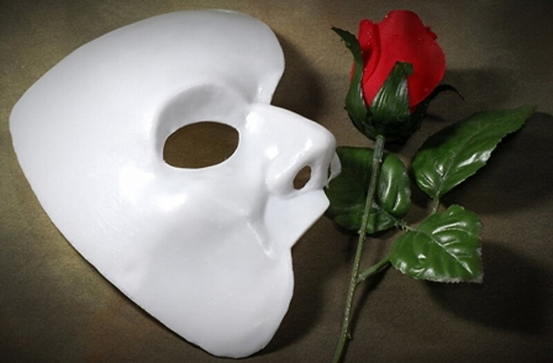 White mask and red rose
