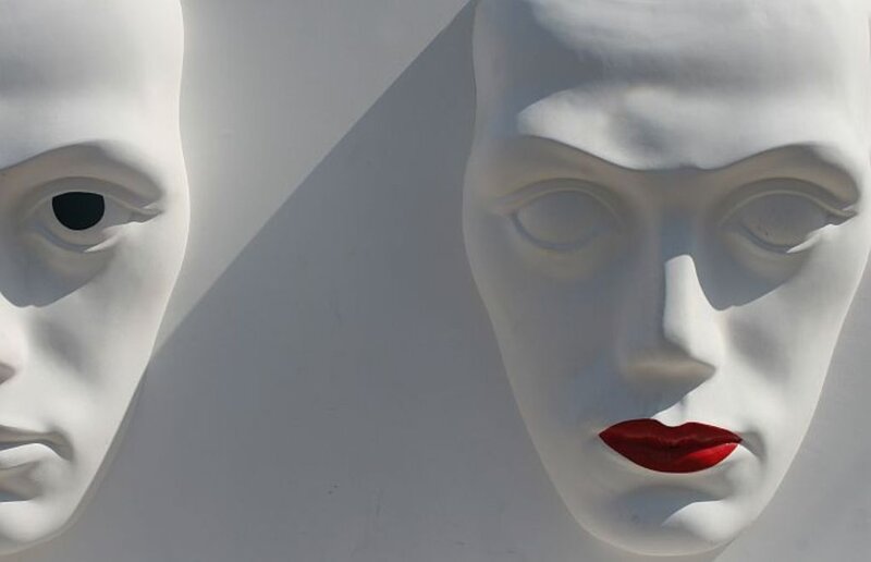 white masks with red lips