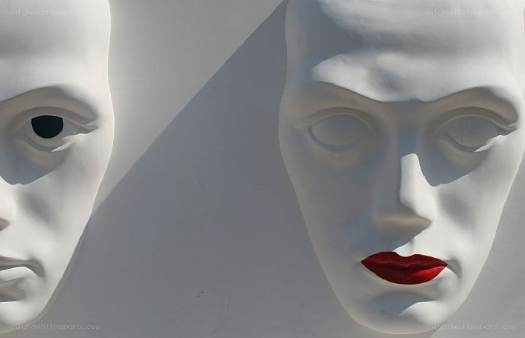 white masks with red lips