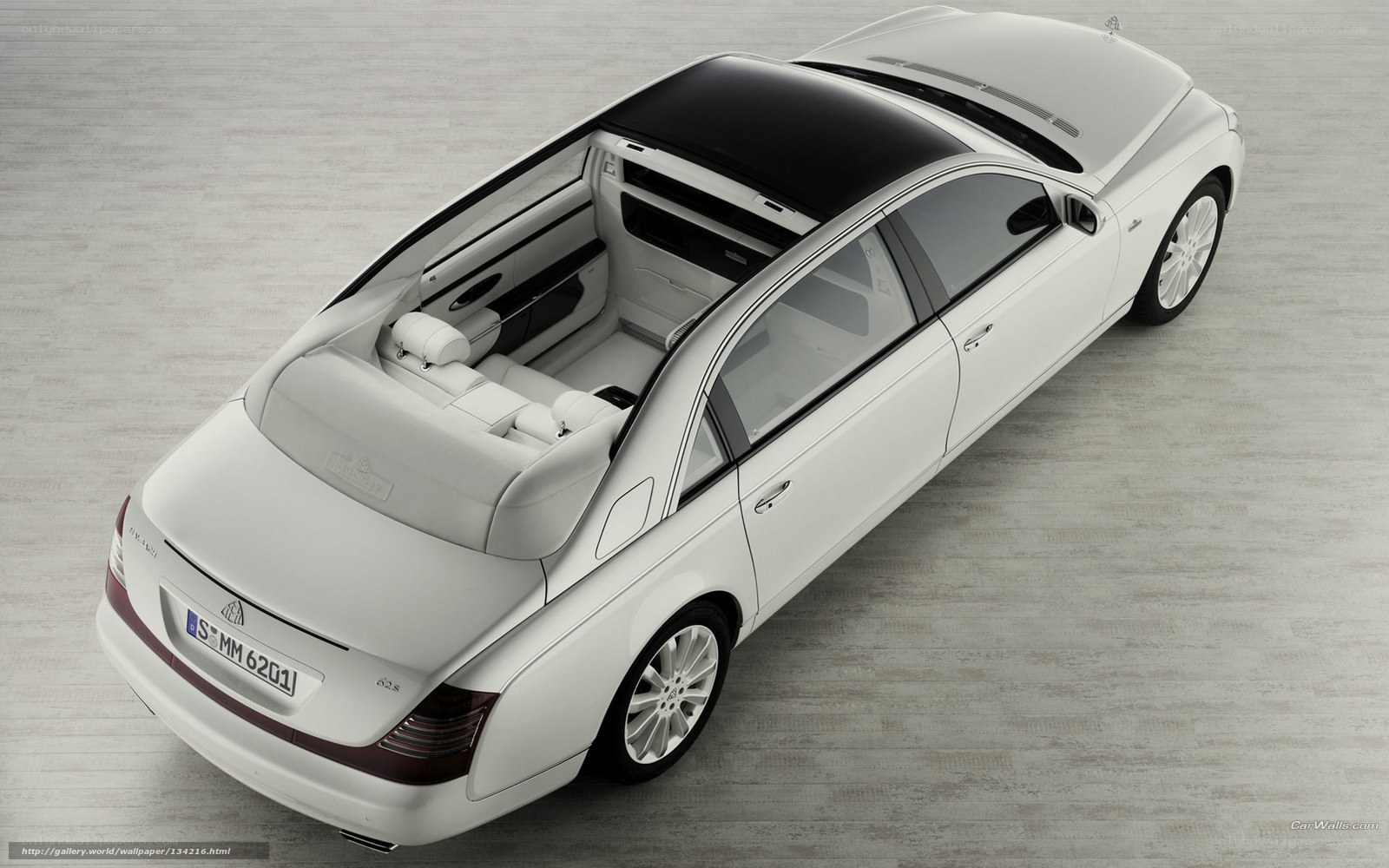 white maybach luxury sedan