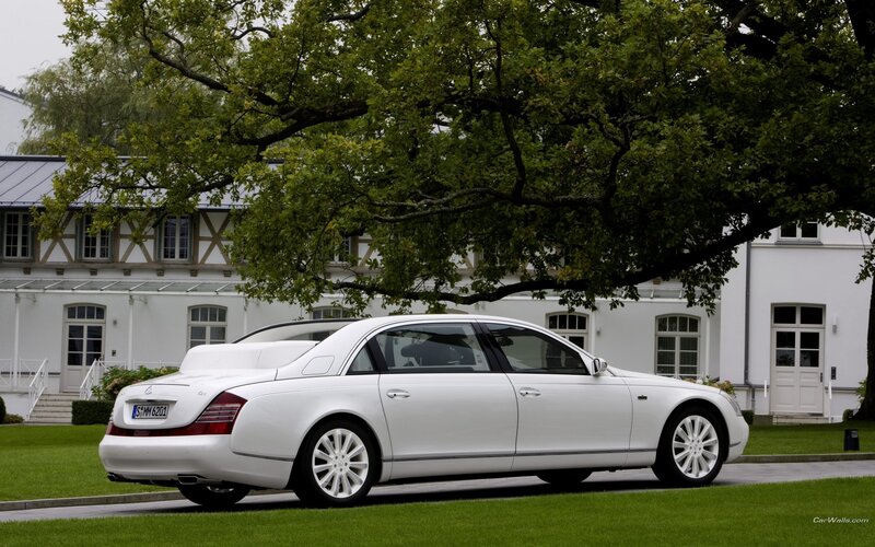 white maybach parked outside