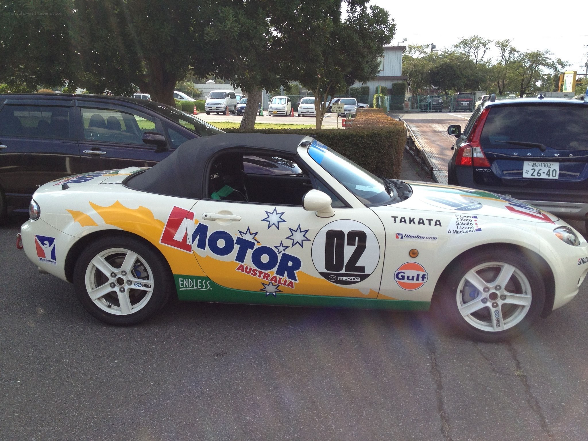 White Mazda Miata race car
