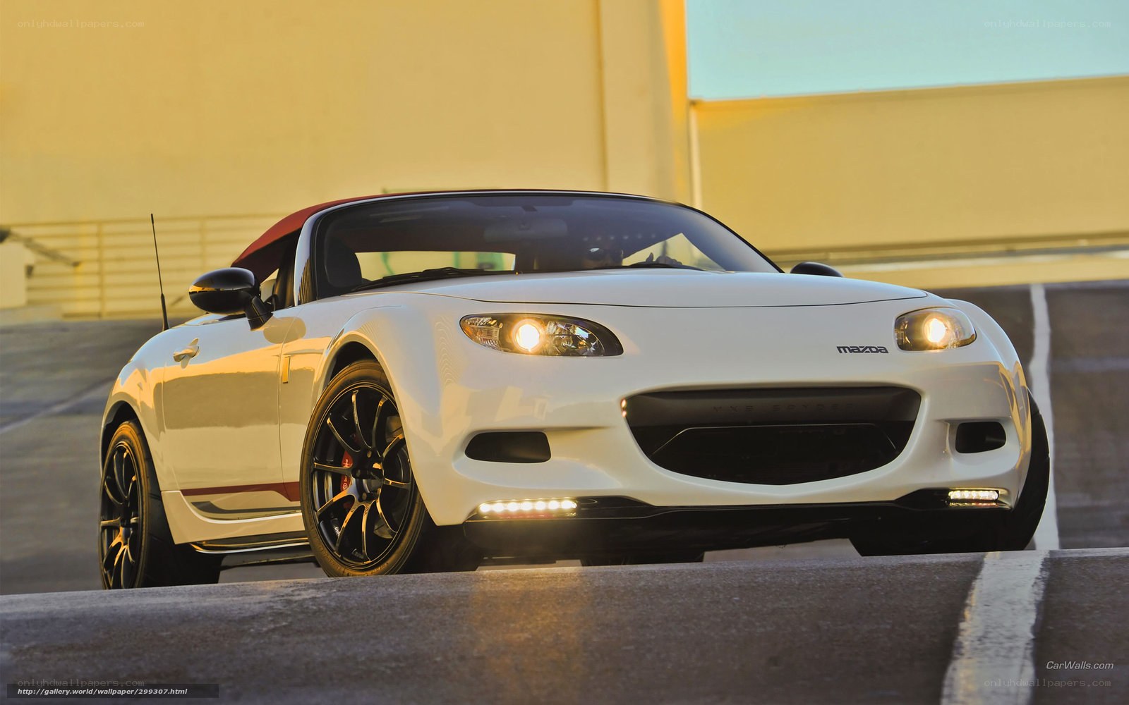 White Mazda Miata sports car