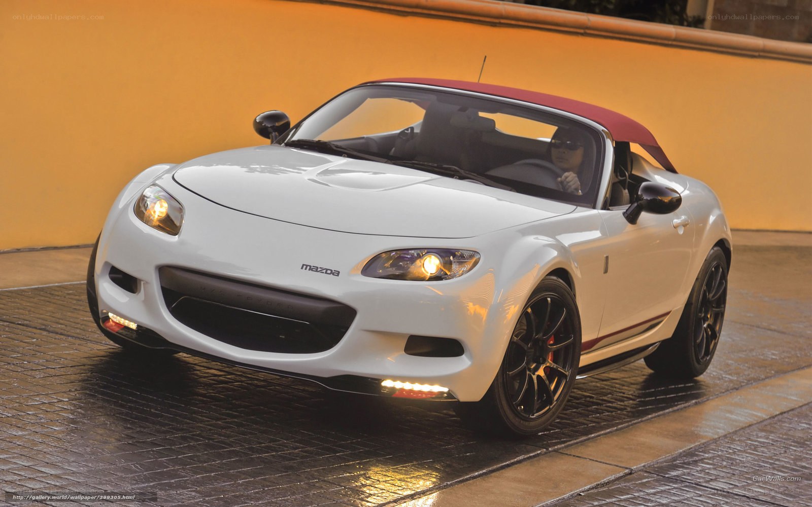 White Mazda Miata with red top