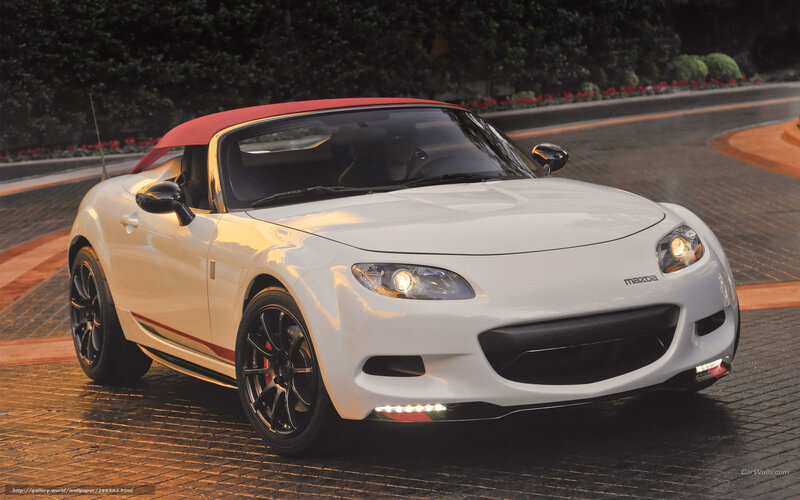 White Mazda MX-5 with red top