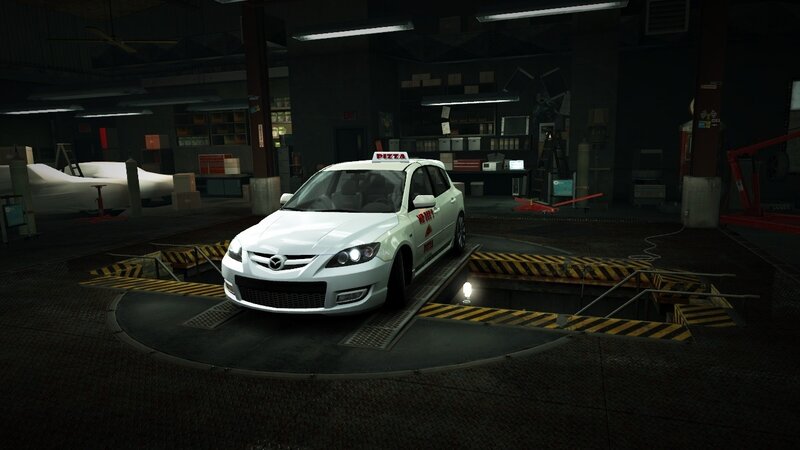 White Mazda on turntable