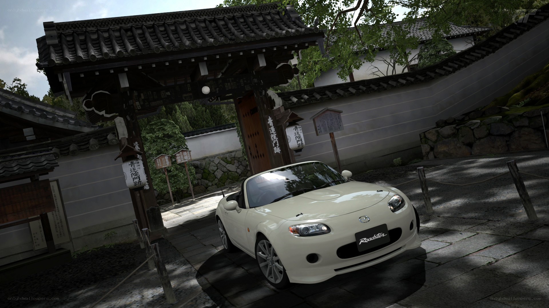 White Mazda Roadster at temple gate