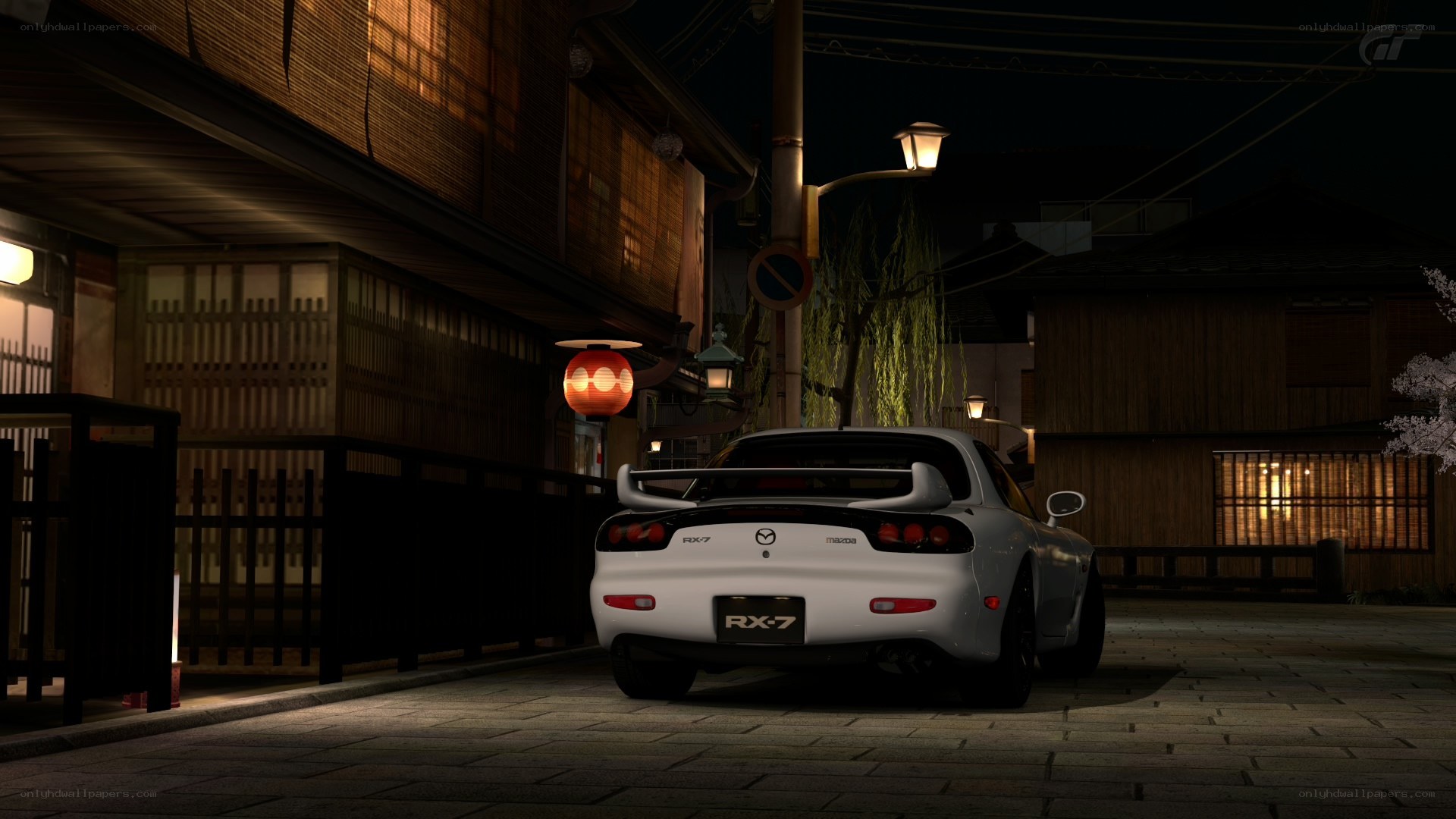 White Mazda RX-7 at night