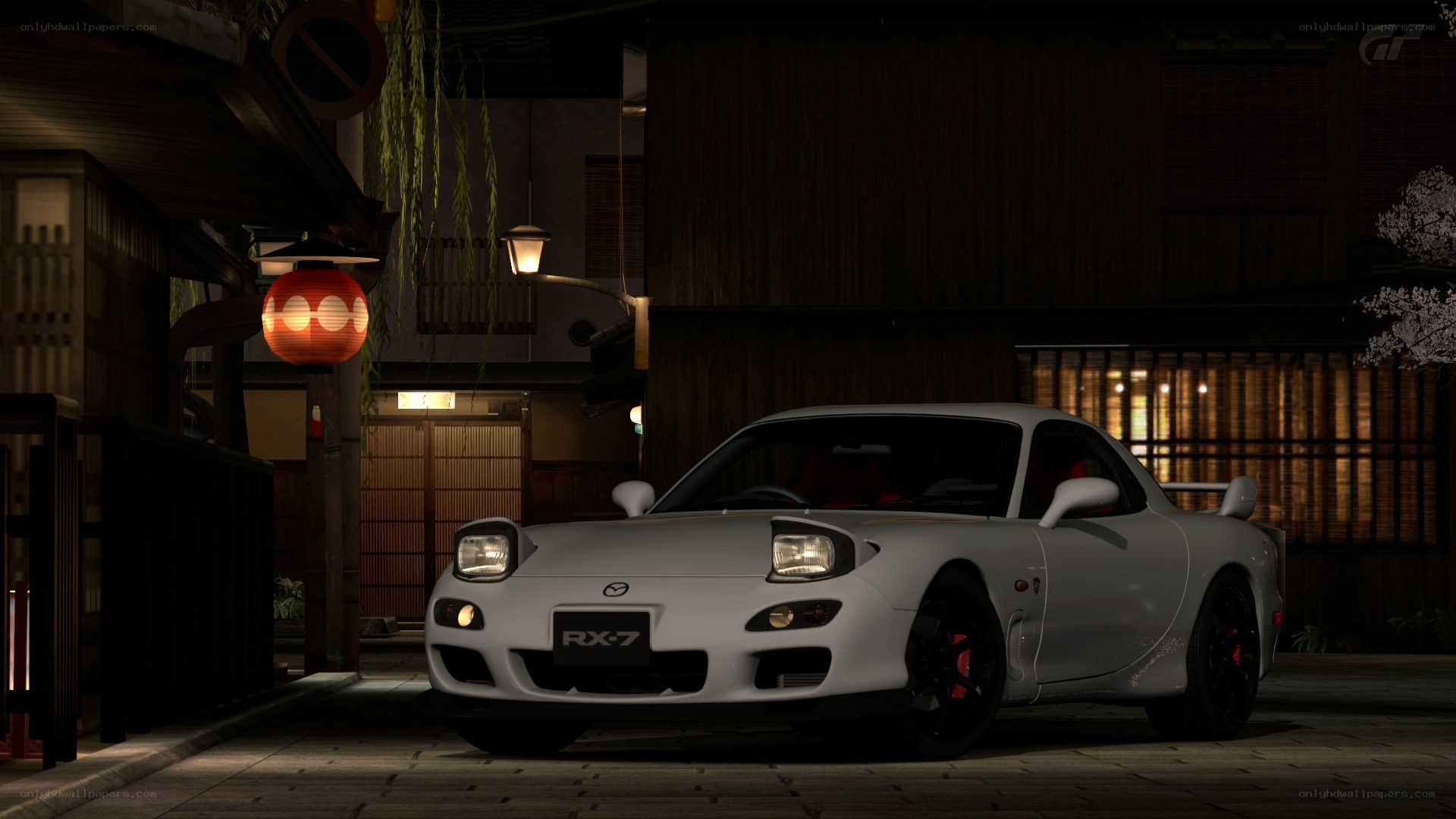 White Mazda RX-7 at night