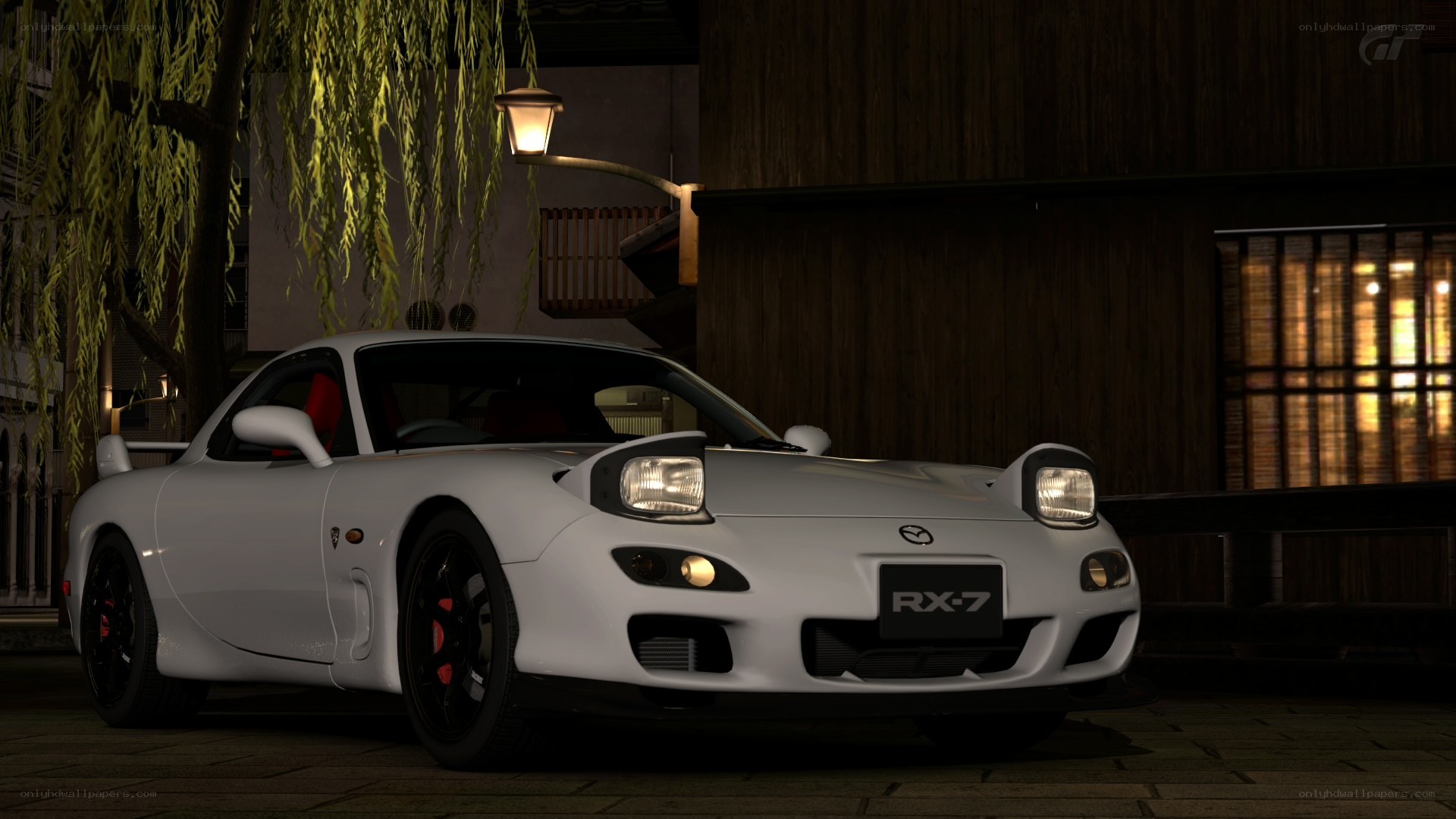 White Mazda RX-7 at night