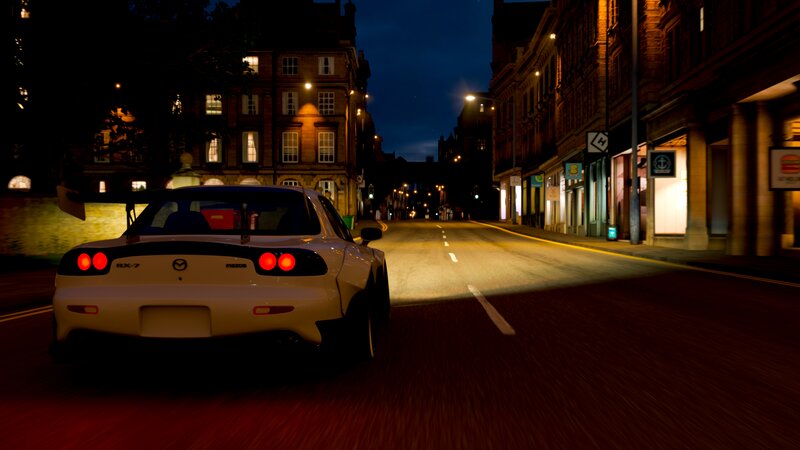 White Mazda RX-7 on Street