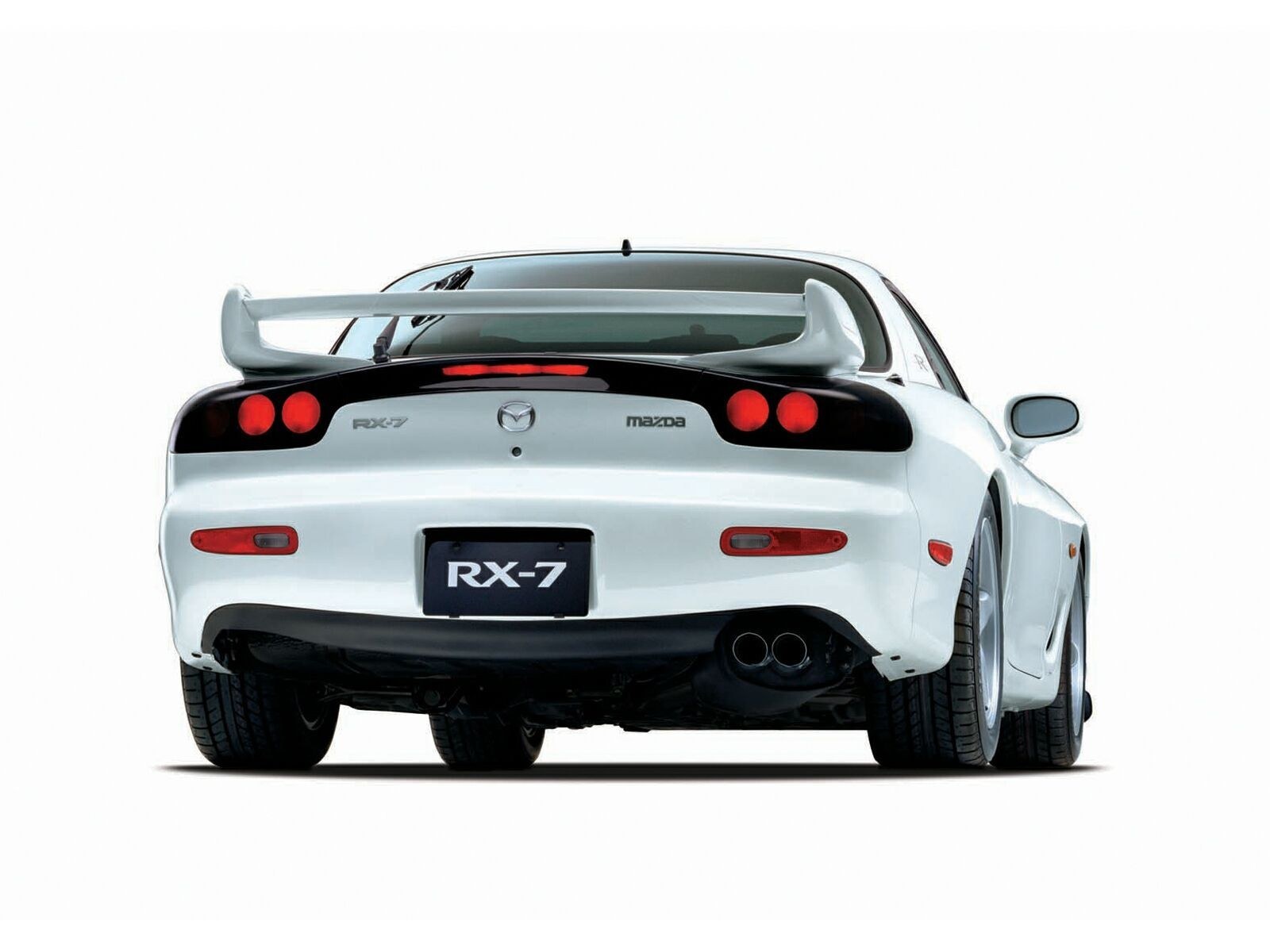 White Mazda RX-7 rear view