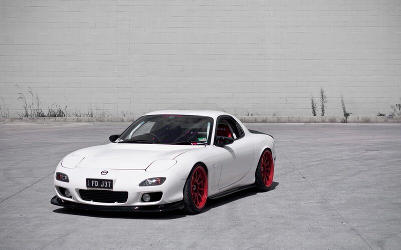 White Mazda RX-7 sports car