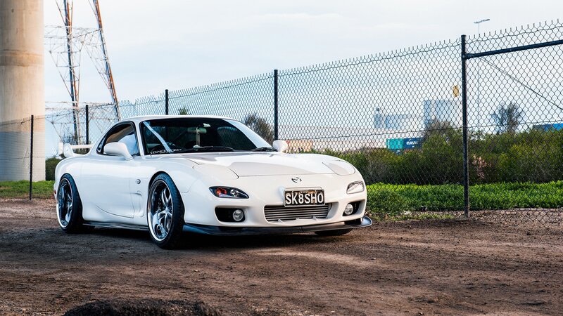 white mazda rx-7 sports car