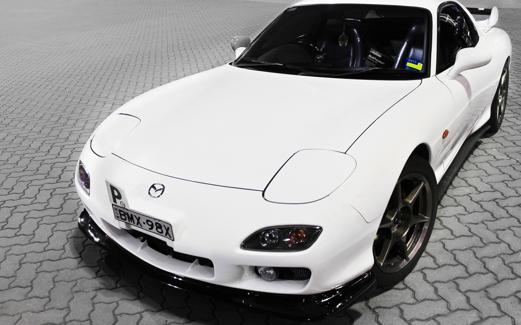 white mazda rx-7 sports car